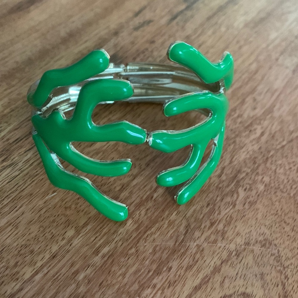 Cuff with hinge gold tone with green enamel style finish